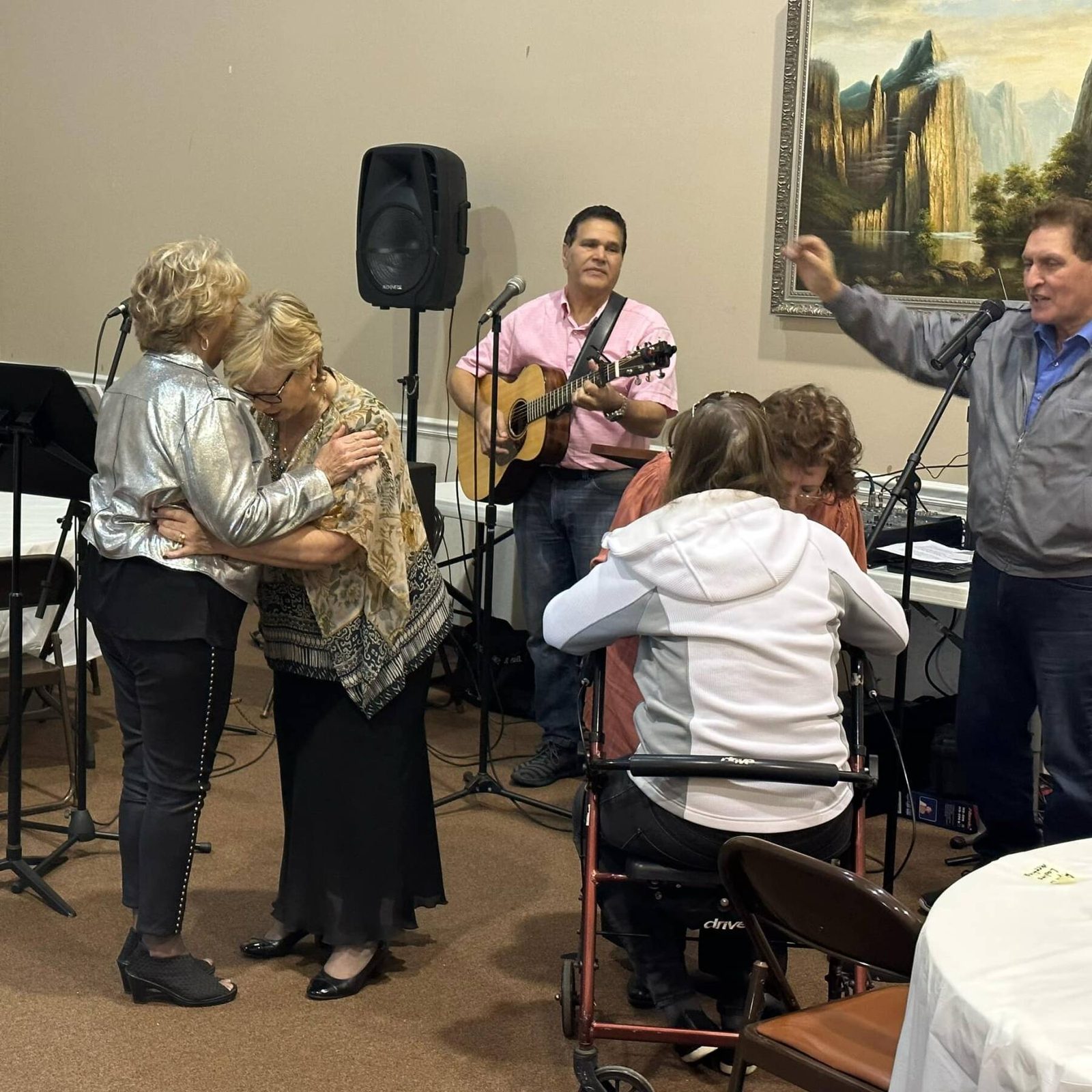 Members of Christ Worship Center praying together